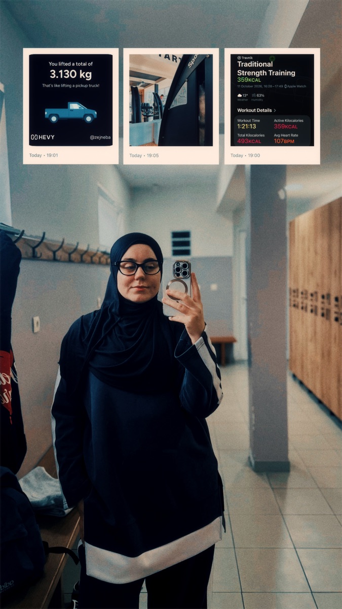 Zejneba taking a mirror selfie in the gym locker room
